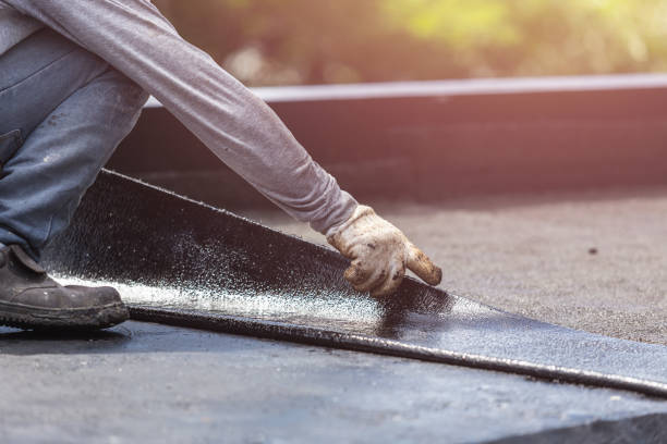 Professional Emergency Waterproofing technician working in Bridgeport, MI